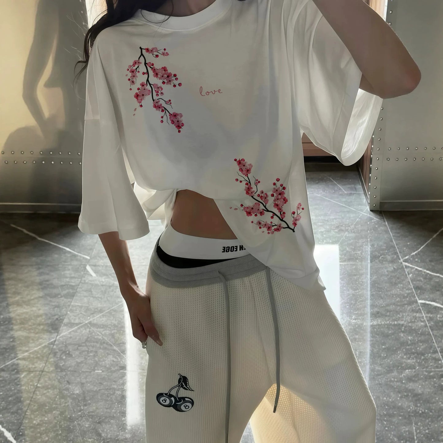 Camiseta holgada con estampado sakura